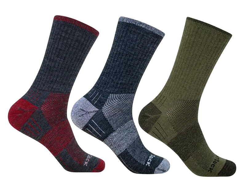 Drei unterschiedlich farbige doppellagige Socken des Modells Merino Escape in der Höhe crew (wadenhoch)